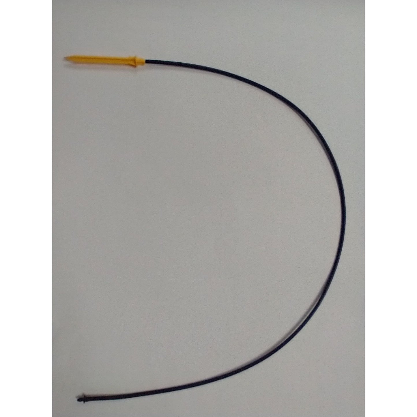 a black and yellow wire with a yellow tip